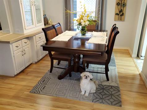 DINING ROOM AND THAT ADORABLE PUPPY IS NOT INCLUDED