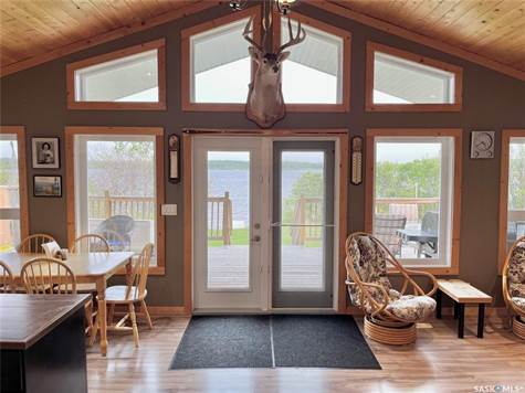 open concept with windows facing the lake