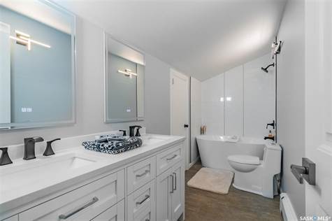 Fully upgraded 4 piece bathroom on 2nd floor, dual vanity, led mirrors, soaker tub, dual flush toiler, new flooring, large storage closet