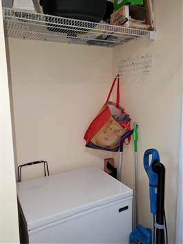AREA IN LAUNDRY ROOM FOR A FREEZER OR SHELVES