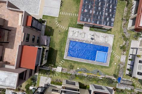 Birds eye view of rooftop terrace and pool