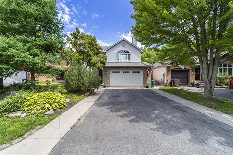 Located on a Quiet, Private Street w/Double Car Garage