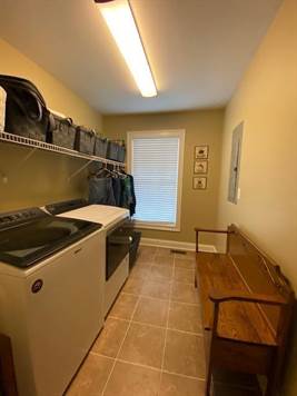 Large tiled Laundry Room 
