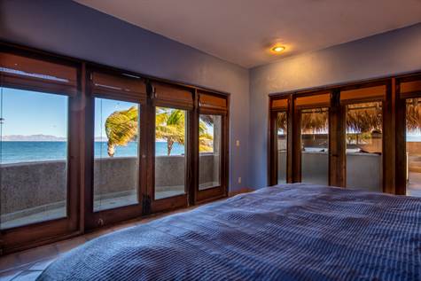Primary bedroom with panoramic sea  views