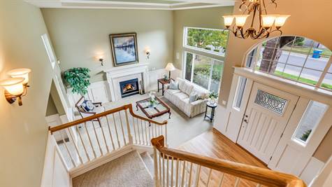 Elegant, yet relaxed, living room with 2 story coved ceiling.