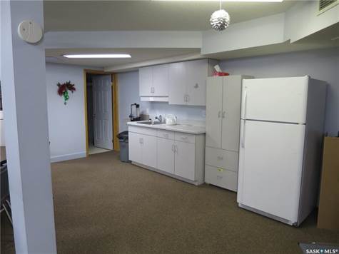 Kitchen and washroom in Amenities Room