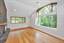 Large panorama windows offering wooded views...