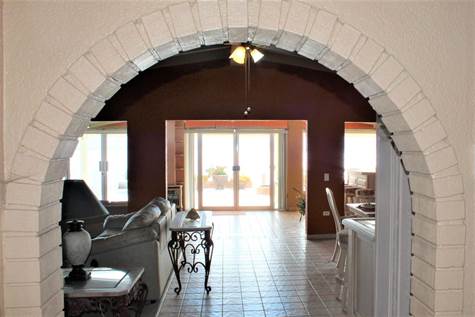arch from bedrooms to living area 