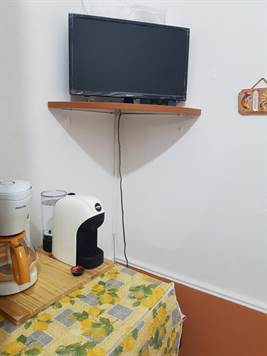 24" TV in Kitchen