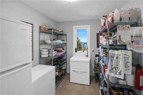 Convenient main floor pantry room off the kitchen