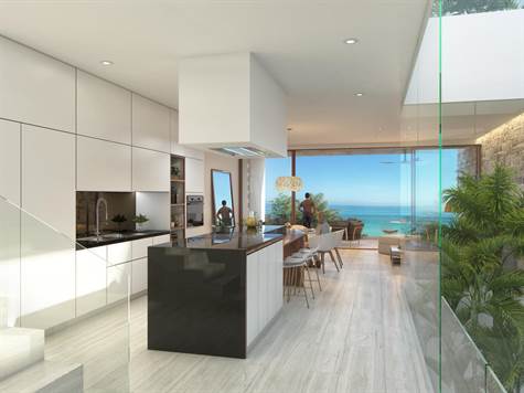 Stunning Beachfront Villa with private beach for Sale in Puerto Aventuras