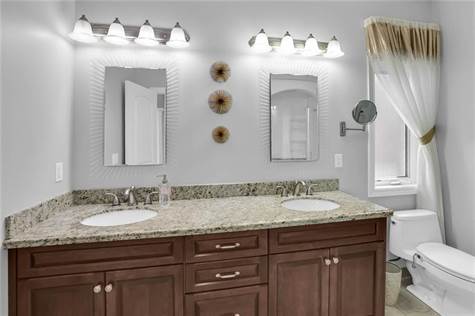 Primary bedroom 4-piece ensuite with double sinks