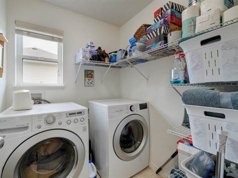 LAUNDRY ROOM WITH WINDOW UP