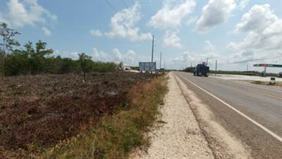 9#2324) - 2.5 ACRES OF LAND WITH HIGHWAY FRONTAGE AT BELIZE CITY.