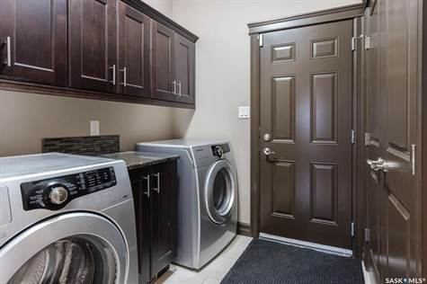 Laundry/mud room with access to the garage