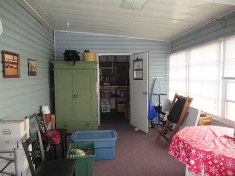 Enclosed porch with shed