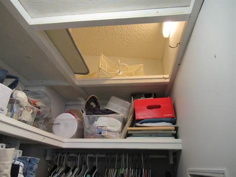 Storage above in closet