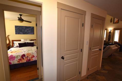 main floor - closet and door to crawl space 