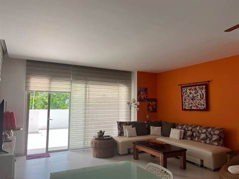 Living room 2BR Condo close to Ocean for Sale in Puerto Morelos 
