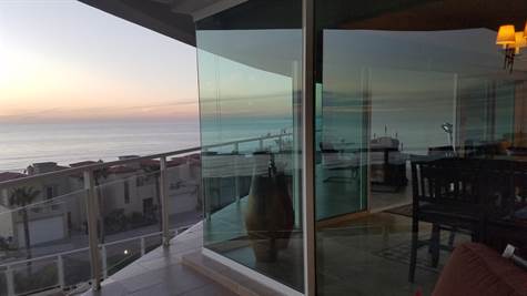 This balcony wraps around the condo for more ocean views
