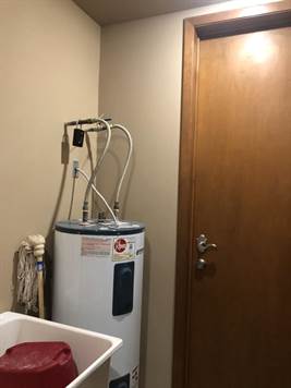 WATER HEATER AND OWNERS CLOSET