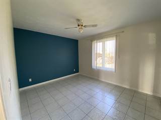 Wide Living Room Interior With Carpet And Dining Room With Tile Floor Capital City Floors