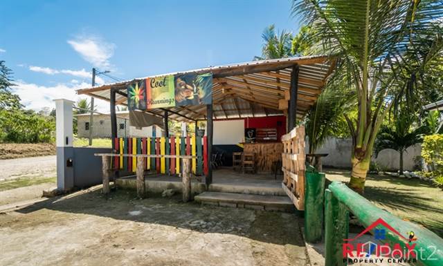 # 4078 - Income Potential - Two-Bedroom Residential Home with Commercial Buildings, Cayo District - photo 9 of 11