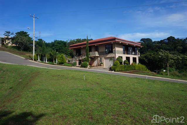 Beautiful Stone Facade House Views of the Central Valley in Hacienda Natura Condominium, Alajuela